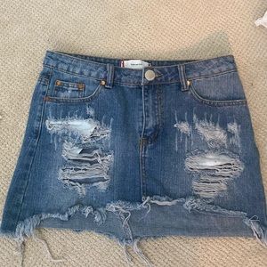 Denim distressed mini skirt